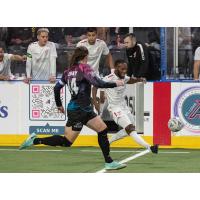 St. Louis Ambush forward William Eskay (left) vs. the Kansas City Comets