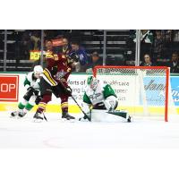 Chicago Wolves' Josiah Slavin versus Texas Stars' Rémi Poirier