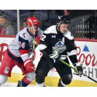 Allen Americans center Harrison Blaisdell (left) closes in on the Wichita Thunder