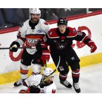 Brayden Watts of the Allen Americans (right) vs. the Kansas City Mavericks